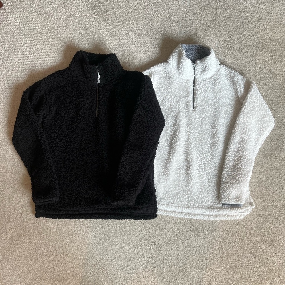 2 sherpas soft 3/4 zip shirts. XS w Stretch. 1 black 1 white